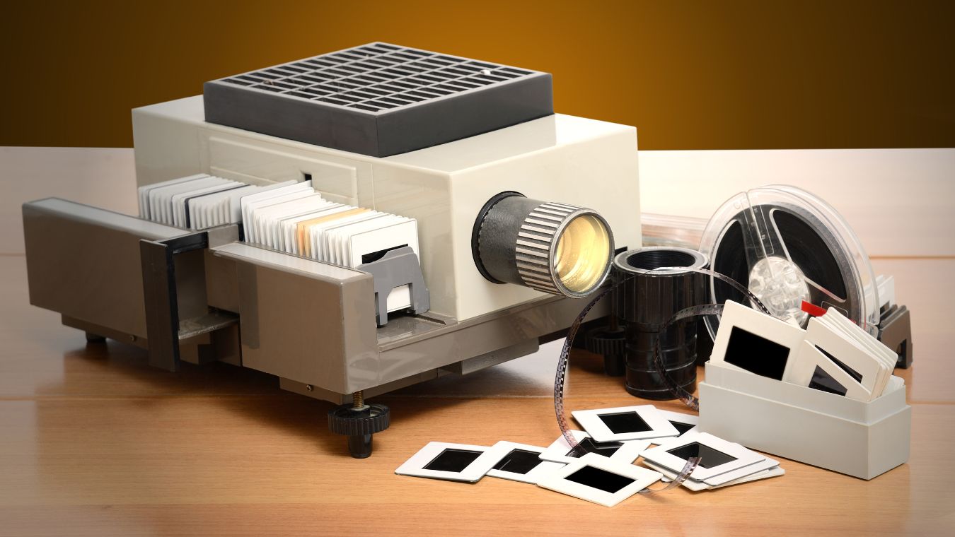 Slide projector and a pile of slides