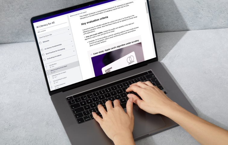 Hands on a laptop keyboard
