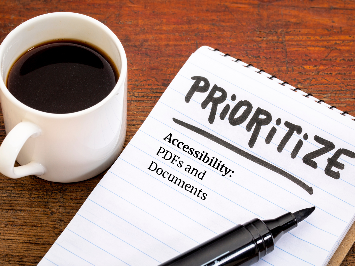 Notebook, pen and cup of coffee